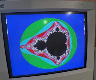 Fractint drawing the Mandelbrot set in bright colours on the PB686's CRT